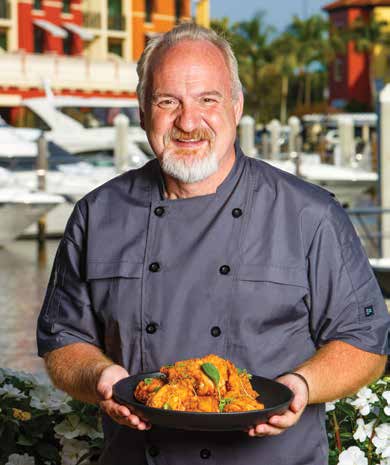 CHEF ART SMITH WITH SPECIALTY DISH, FRIED CHICKEN