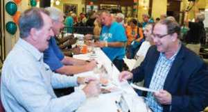 CHARLIE BABB AND LARRY BALL SIGNED AUTOGRAPHS FOR DOZENS OF FANS AT THE CELEBRITY BARTENDER EVENT AT HILTON NAPLES, TO BENEFIT UNITED WAY OF COLLIER COUNTY.