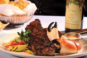YABBA ISLAND GRILL OFFERS AN AFFORDABLE WIDE RANGE OF WET-AGED STEAKS, SUCH AS A 12-OUNCE NY STRIP, WITH AN ARRAY OF SEAFOOD COMBOS, INCLUDING FRESH FLORIDA STONE CRAB CLAWS. PHOTO BY KEITH ISAAC PHOTOGRAPHY