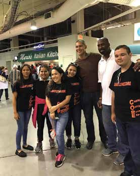 MEMBERS OF LELY HIGH SCHOOL’S CORE SOCIETY POSE WITH DRUG FREE COLLIER’S COMMUNITY AMBASSADOR, IKE ALAMA-FRANCIS AND DAVID JONES, PRESIDENT OF ATHLETES AGAINST BULLIES. Photo Credit: ALBERTO DELEON